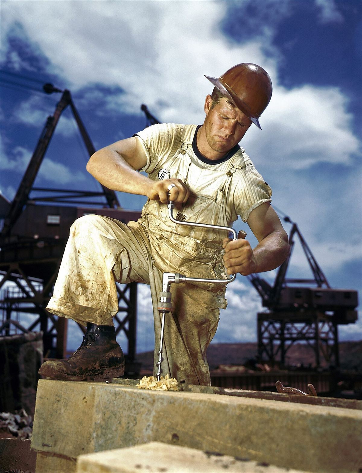 A carpenter working with timber