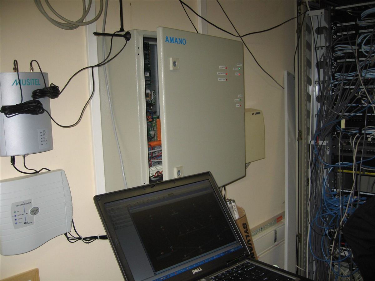 A technician servicing network equipment