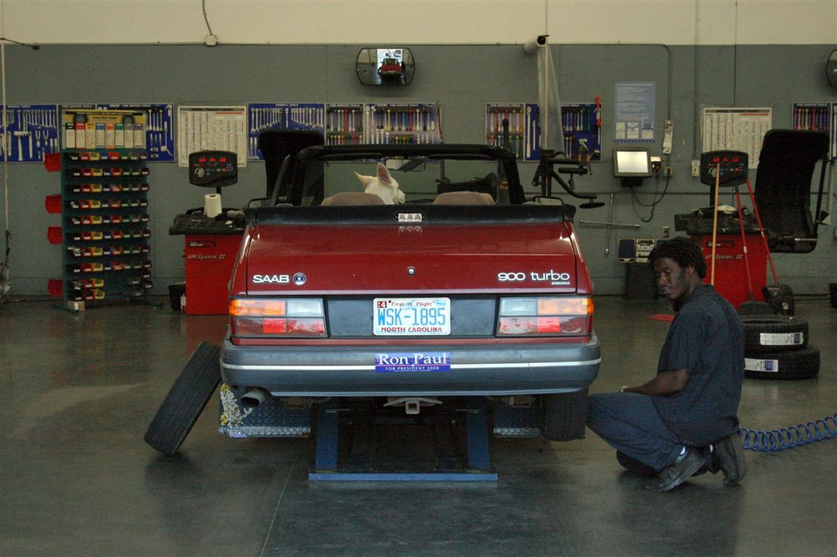 A mechanic working on a vehicle